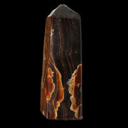 Chocolate Calcite obelisk 91*34mm 211g in sunlight - Rocks and Things Store