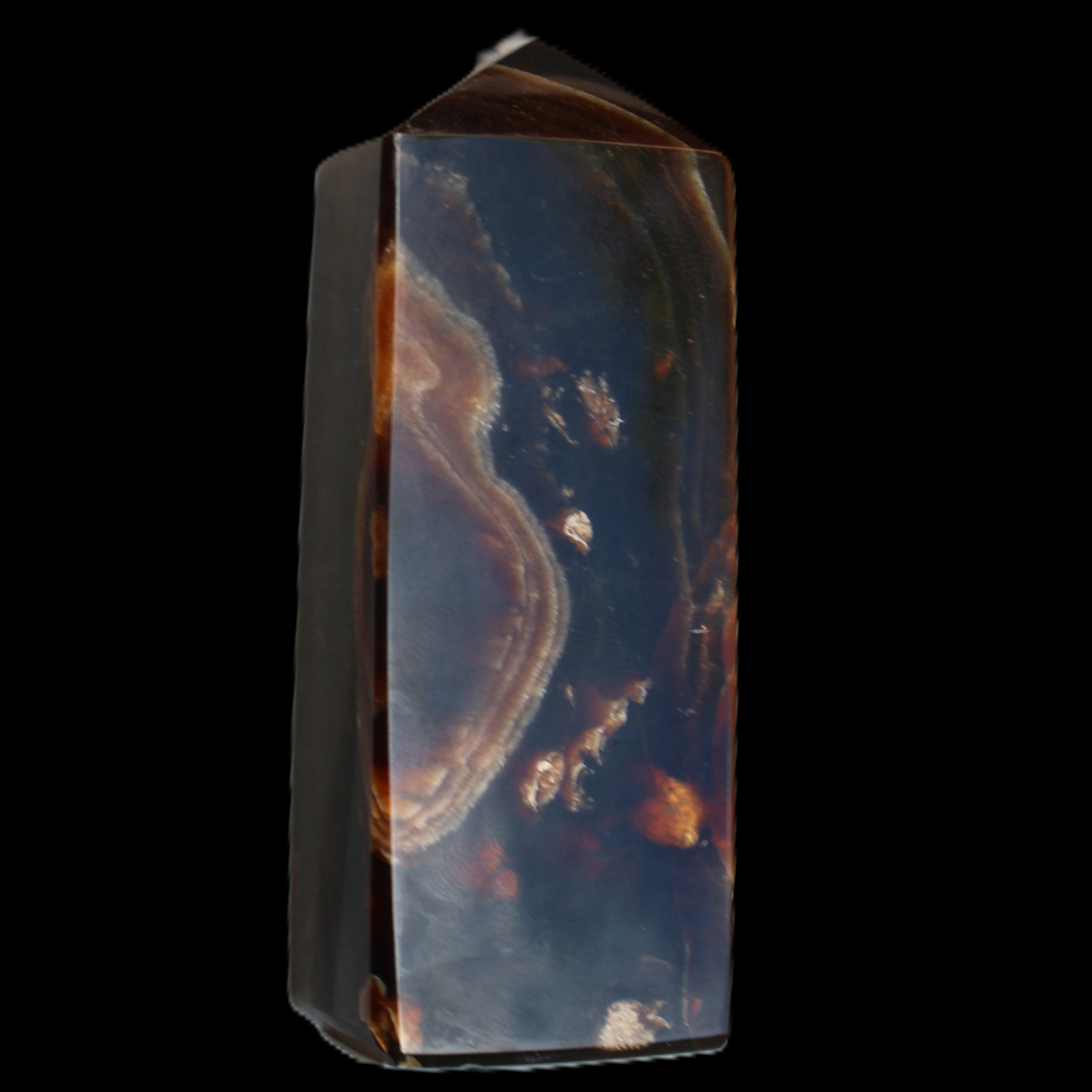 Chocolate Calcite obelisk 91*34mm 211g in sunlight - Rocks and Things Store