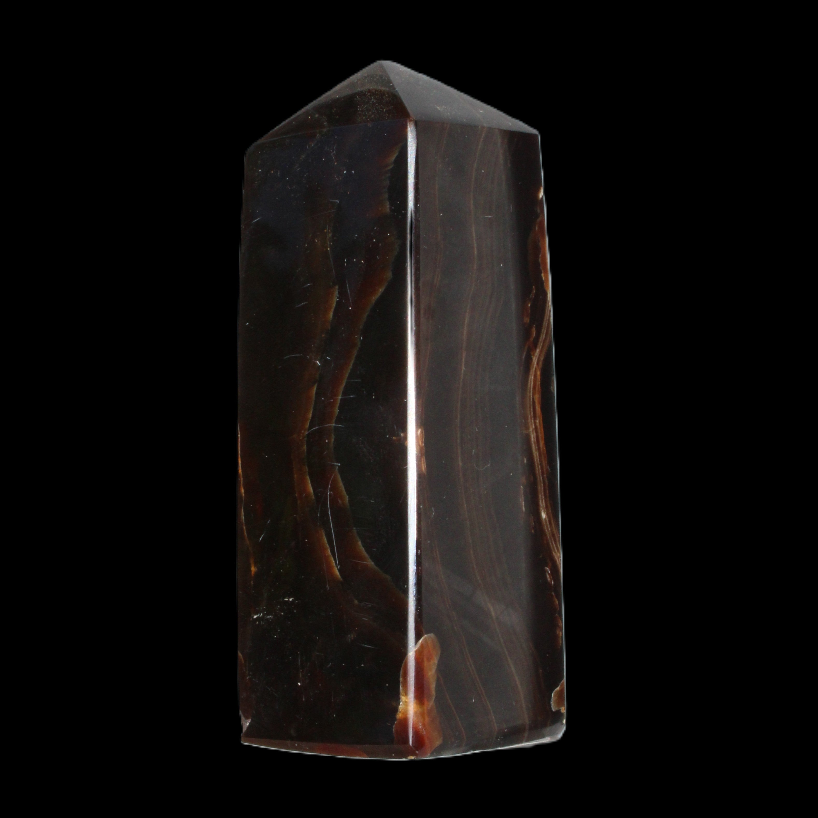Chocolate Calcite obelisk 91*34mm 211g in sunlight - Rocks and Things Store