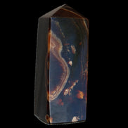 Chocolate Calcite obelisk 91*34mm 211g in sunlight - Rocks and Things Store