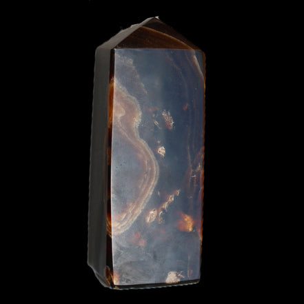 Chocolate Calcite obelisk 91*34mm 211g in sunlight - Rocks and Things Store