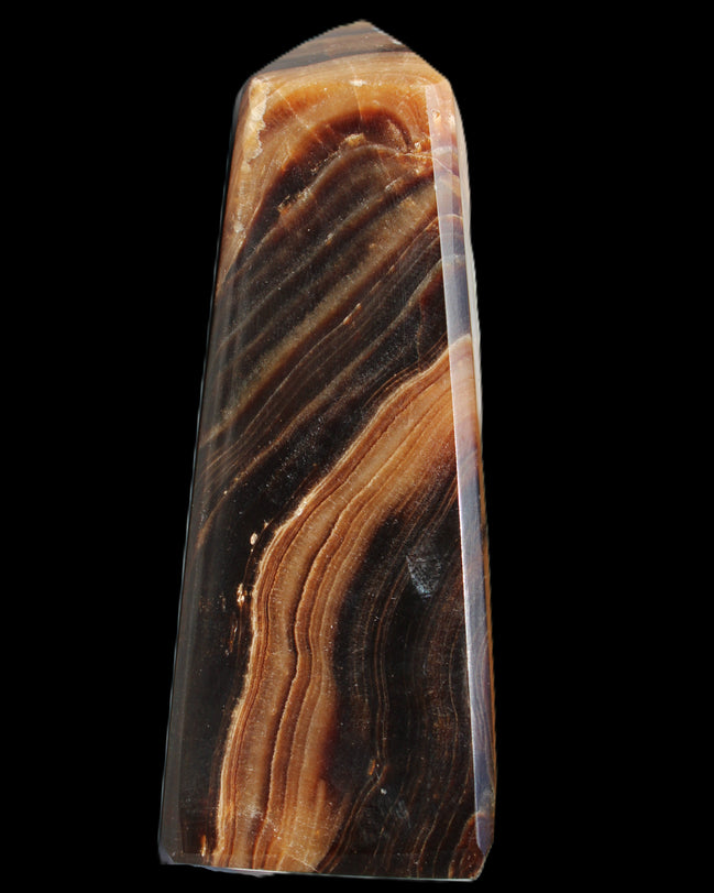 Chocolate Calcite obelisk 103*35mm 268g in sunlight - Rocks and Things Store