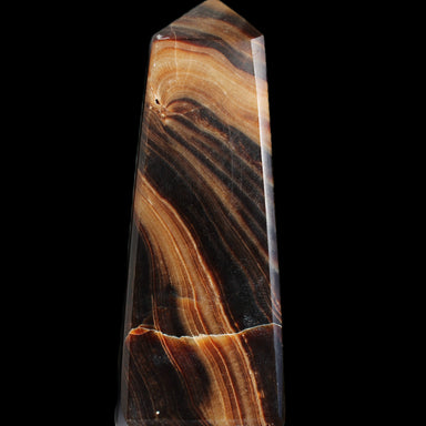 Chocolate Calcite obelisk 103*35mm 268g in sunlight - Rocks and Things Store