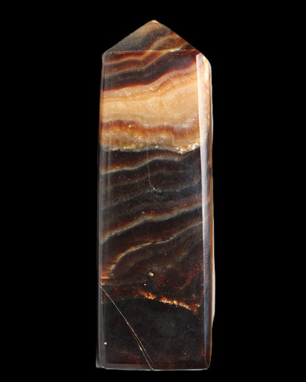 Chocolate Calcite obelisk 103*35mm 268g in sunlight - Rocks and Things Store