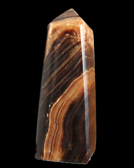 Chocolate Calcite obelisk 103*35mm 268g in sunlight - Rocks and Things Store