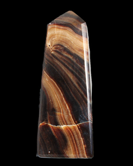 Chocolate Calcite obelisk 103*35mm 268g in sunlight - Rocks and Things Store