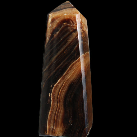 Chocolate Calcite obelisk 103*35mm 268g in sunlight - Rocks and Things Store