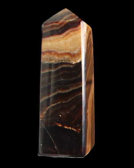 Chocolate Calcite obelisk 103*35mm 268g in sunlight - Rocks and Things Store