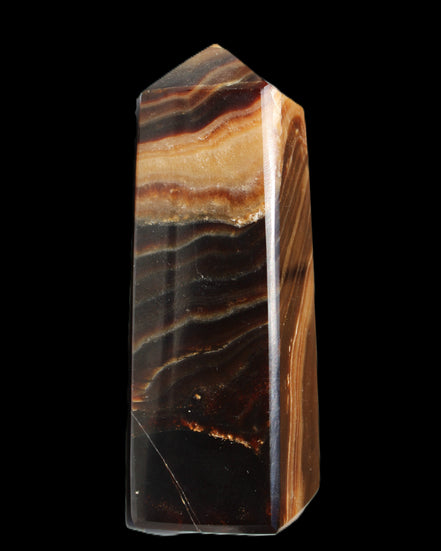 Chocolate Calcite obelisk 103*35mm 268g in sunlight - Rocks and Things Store