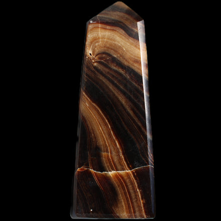 Chocolate Calcite obelisk 103*35mm 268g in sunlight - Rocks and Things Store