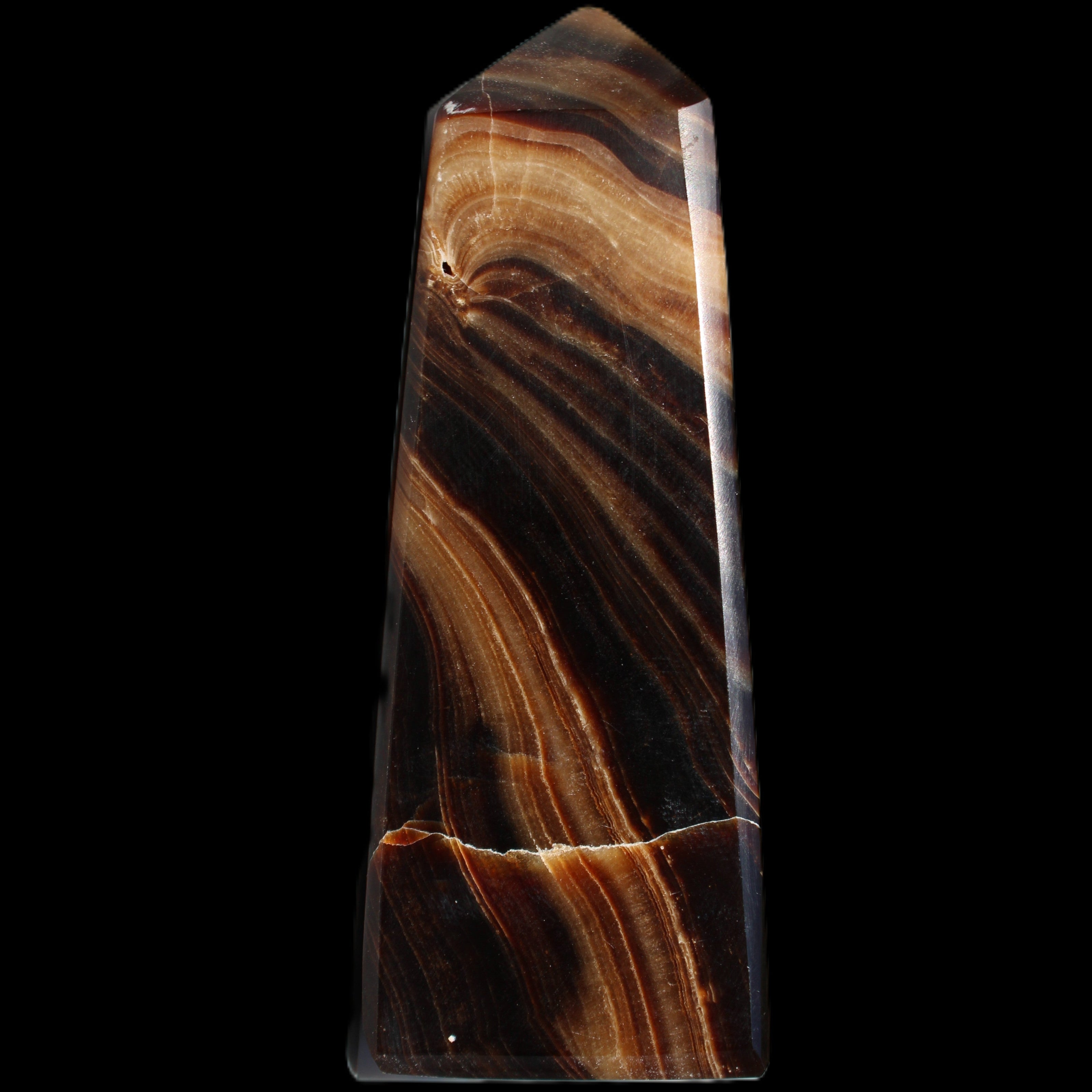 Chocolate Calcite obelisk 103*35mm 268g in sunlight - Rocks and Things Store