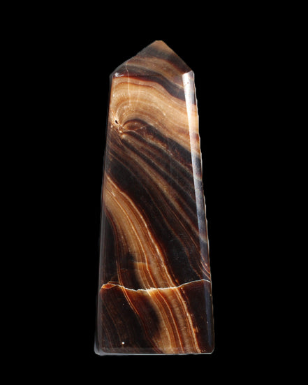 Chocolate Calcite obelisk 103*35mm 268g in sunlight - Rocks and Things Store