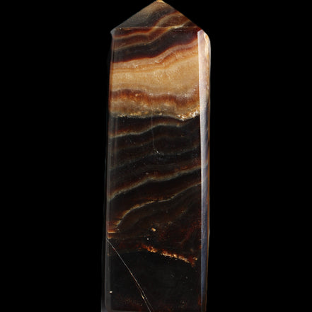 Chocolate Calcite obelisk 103*35mm 268g in sunlight - Rocks and Things Store