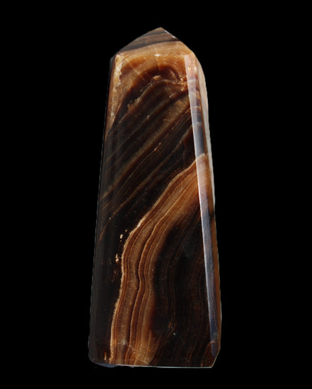 Chocolate Calcite obelisk 103*35mm 268g in sunlight - Rocks and Things Store