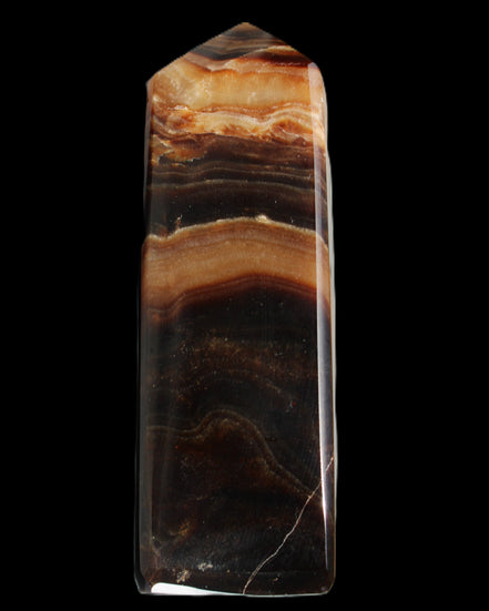 Chocolate Calcite obelisk 103*35mm 268g in sunlight - Rocks and Things Store