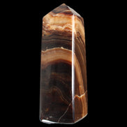 Chocolate Calcite obelisk 103*35mm 268g in sunlight - Rocks and Things Store