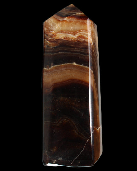 Chocolate Calcite obelisk 103*35mm 268g in sunlight - Rocks and Things Store