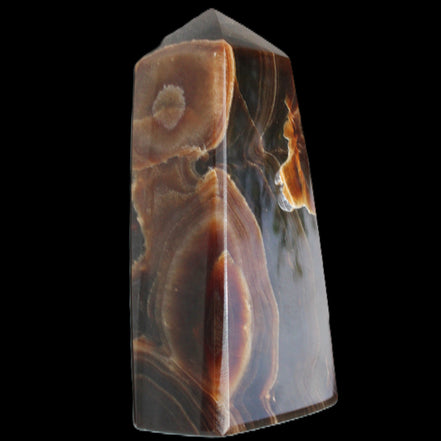 Chocolate Calcite obelisk 97*39mm 243g in sunlight - Rocks and Things Store