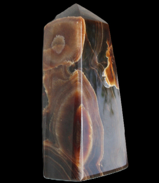 Chocolate Calcite obelisk 97*39mm 243g in sunlight - Rocks and Things Store