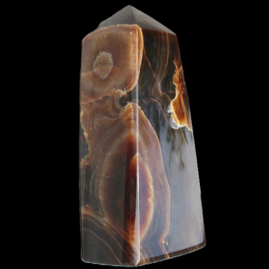 Chocolate Calcite obelisk 97*39mm 243g in sunlight - Rocks and Things Store