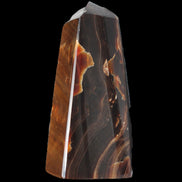 Chocolate Calcite obelisk 97*39mm 243g in sunlight - Rocks and Things Store