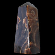 Chocolate Calcite obelisk 97*39mm 243g in sunlight - Rocks and Things Store