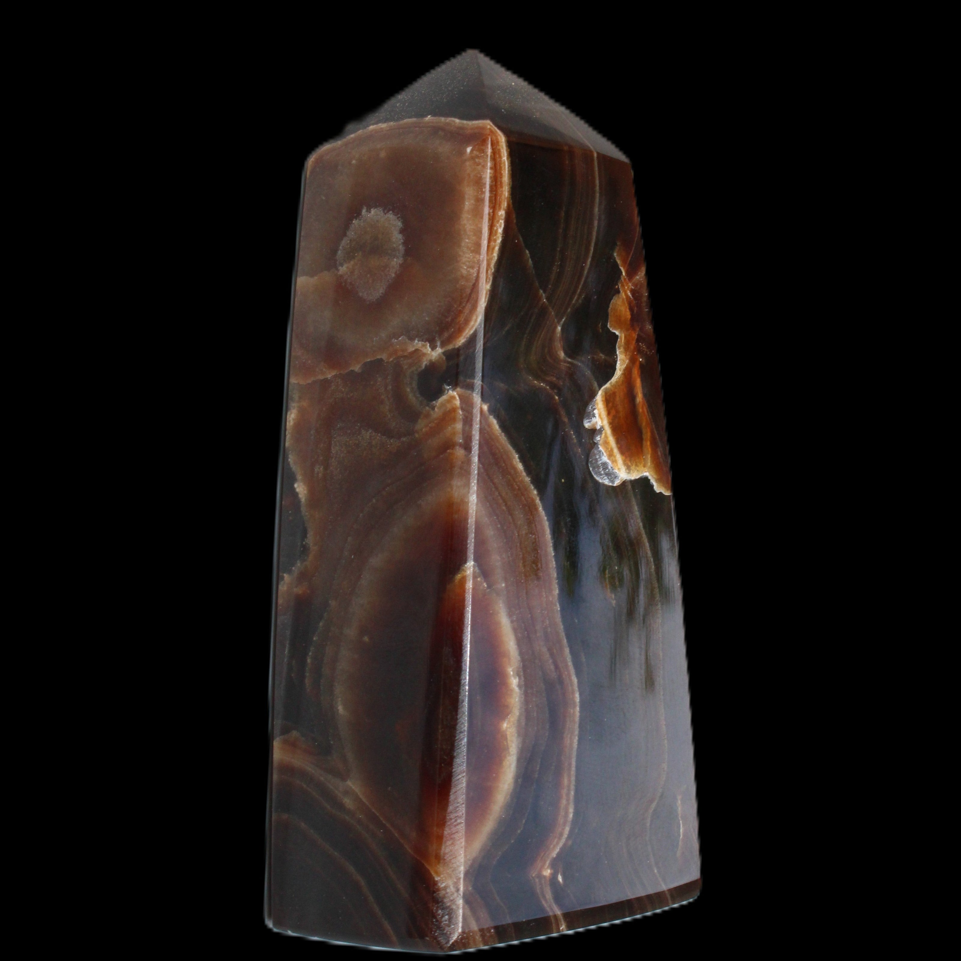 Chocolate Calcite obelisk 97*39mm 243g in sunlight - Rocks and Things Store