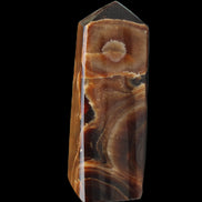 Chocolate Calcite obelisk 97*39mm 243g in sunlight - Rocks and Things Store