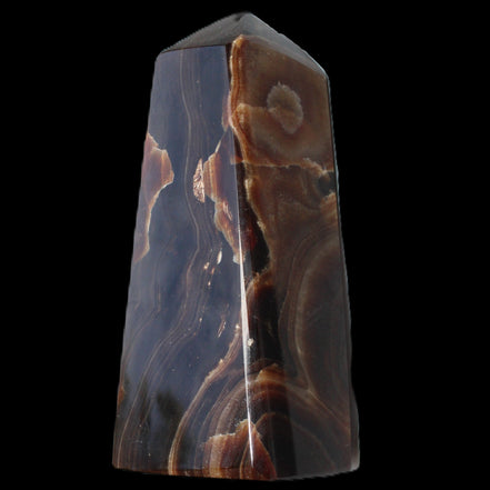 Chocolate Calcite obelisk 97*39mm 243g in sunlight - Rocks and Things Store