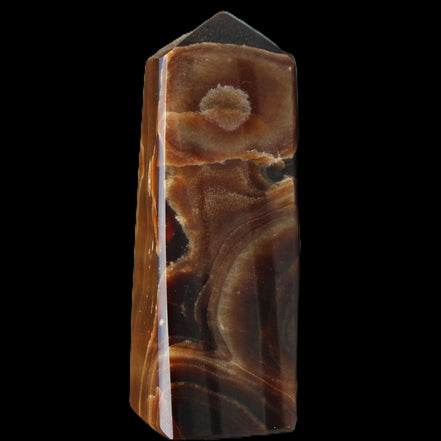 Chocolate Calcite obelisk 97*39mm 243g in sunlight - Rocks and Things Store