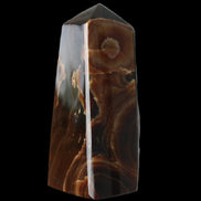 Chocolate Calcite obelisk 97*39mm 243g in sunlight - Rocks and Things Store