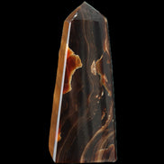 Chocolate Calcite obelisk 97*39mm 243g in sunlight - Rocks and Things Store