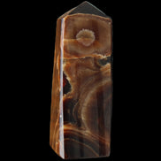 Chocolate Calcite obelisk 97*39mm 243g in sunlight - Rocks and Things Store