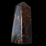 Chocolate Calcite obelisk 97*39mm 243g in sunlight - Rocks and Things Store