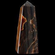 Chocolate Calcite obelisk 97*39mm 243g in sunlight - Rocks and Things Store