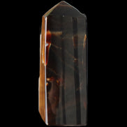 Chocolate Calcite obelisk 97*39mm 243g in sunlight - Rocks and Things Store