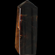 Chocolate Calcite obelisk 97*39mm 243g in sunlight - Rocks and Things Store
