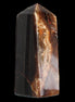 Chocolate Calcite obelisk 100*40mm 286g in sunlight - Rocks and Things Store