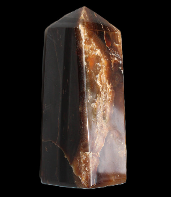 Chocolate Calcite obelisk 100*40mm 286g in sunlight - Rocks and Things Store