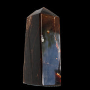 Chocolate Calcite obelisk 100*40mm 286g in sunlight - Rocks and Things Store