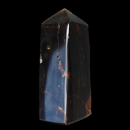 Chocolate Calcite obelisk 100*40mm 286g in sunlight - Rocks and Things Store