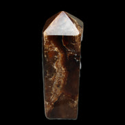 Chocolate Calcite obelisk 100*40mm 286g in sunlight - Rocks and Things Store