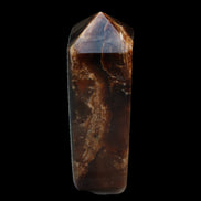 Chocolate Calcite obelisk 100*40mm 286g in sunlight - Rocks and Things Store