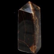 Chocolate Calcite obelisk 100*40mm 286g in sunlight - Rocks and Things Store