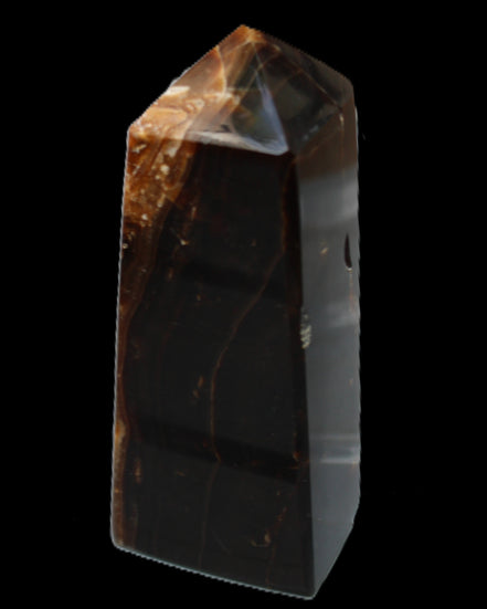 Chocolate Calcite obelisk 100*40mm 286g in sunlight - Rocks and Things Store