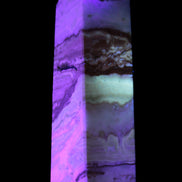 Caribbean aqua blue Calcite obelisk 479g in UV light - Rocks and Things Store