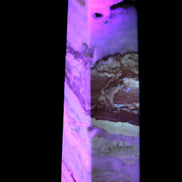 Caribbean aqua blue Calcite obelisk 479g in UV light - Rocks and Things Store