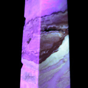 Caribbean aqua blue Calcite obelisk 479g in UV light - Rocks and Things Store