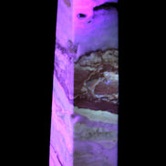 Caribbean aqua blue Calcite obelisk 479g in UV light - Rocks and Things Store