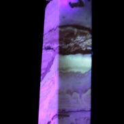 Caribbean aqua blue Calcite obelisk 479g in UV light - Rocks and Things Store